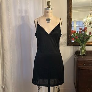 Black slip dress by Wendy McCauley in size Medium